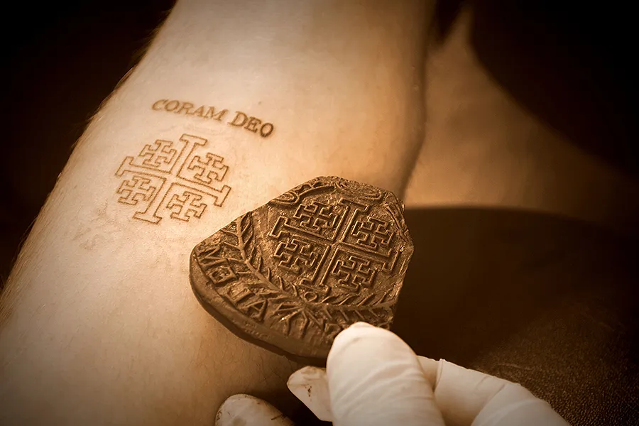 roman catholic symbols tattoos
