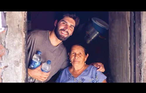  - Adam_Groshong_with_the_grandmother_of_Jenny_from_El_Salvador_whose_tuition_is_being_paid_by_Marin_Catholic_fundraising_Credit_Tom_Latinovich_via_Catholic_San_Francisco_CNA