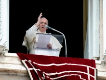 Pope Francis gives a blessing after his Angelus address on Aug. 30, 2020.