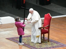 Pope Francis presides at the Stations of the Cross outside St. Peter's Basilica, April 2, 2021.