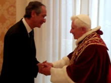 President Alvaro Colom Caballeros greets Pope Benedict in the Papal Library.