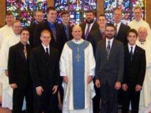 Bishop Aquila poses with seminarians at Cardinal Muench Seminary.