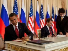 President Barack Obama and President Medvedev sign the START treaty.