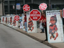 Pro-lifers protest the UW plan to perform late-term abortions.