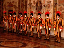 Swiss guards stand at the ready in the Vatican.