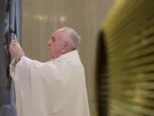 Pope Francis celebrates Mass in the chapel of the Casa Santa Marta April 18, 2020. 