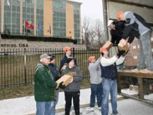 Knights of Columbus loading the military prayer books for U.S. servicemen.