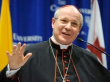 Cardinal Christoph Schönborn addresses a packed room at Catholic University of America. 