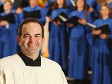 Peter Latona appears with the choir of the Basilica of the Immaculate Conception. 