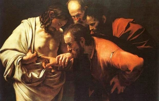 Thomas touches the wounds of the Risen Jesus.  