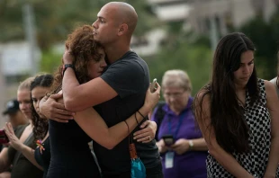 Mourners at a memorial for the victims of the Orlando shooting.   Drew Angerer / Getty Images News.