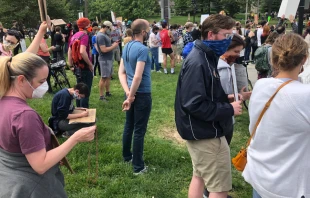 Demonstrators pray the rosary near the St. John Paul II Shrine in Washington, D.C., June 2, 2020,   CNA