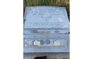 Vandalized monument at Our Lady of the Assumption Church in Bloomingburg, New York.   Fr. Nicholas Blackwell