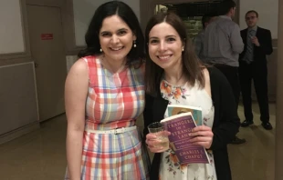 Elise Amez-Droz (right), after her confirmation at the 2019 Easter Vigil, stands with friend Lauretta Brown. Courtesy photo. 