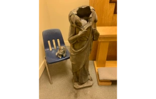 Statue of Christ the Good Shepherd after attack Tuesday night.   Archdiocese of Miami