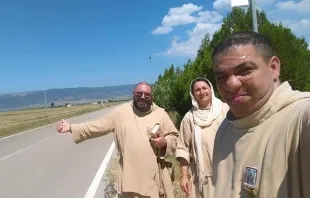 Friar Juan Maria Crisostomo (Right) hitchhiking with a fellow friar and Little Sister of Jesus and Mary.   Poor Friars.
