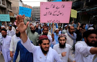 Supporters of a religious group march during a rally in support of Khalid Khan, who killed a man accused of blasphemy, in Peshawar on July 31, 2020. Credit: Abdul Majeed/AFP via Getty Images