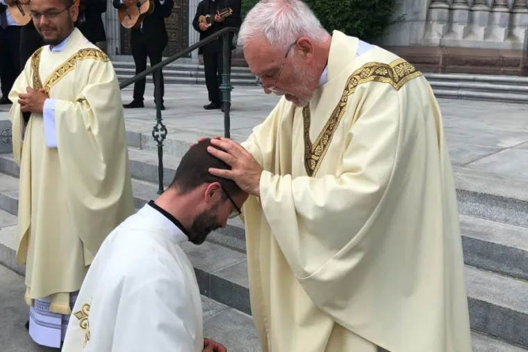 Father Edmond Ilg gives his first blessing to his son, Fr. Philip Ilg, outside Cathedral Basilica of the Sacred Heart in Newark, NJ. Image courtesy of the Ilg family.