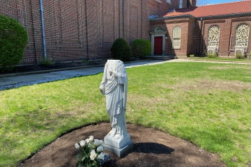 A statue of Christ at St. Charles Borromeo parish in Waltham, Mass., that was vandalized May 2-3, 2021.