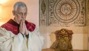 Father Arturo Sosa, superior general of the Society of Jesus, prepares to celebrate Mass at the Gesu in Rome on Oct. 15, 2016.