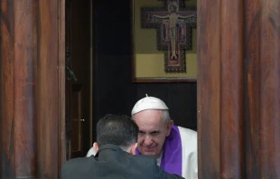 Pope Francis hears confessions at St. John Lateran in Rome March 2, 2017.   Vatican Media.