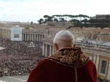 Pope Benedict blesses the crowd at St. Peter's square on Christmas day