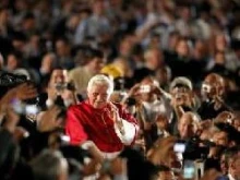 Pope Benedict moves through the thousands of priests gathered to close the Year for Priests in Rome.