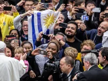 Pope Francis greets pilgrims during his weekly audience, Dec. 11, 2019. 