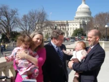 (L to R) Maggie Keating, Cheri Keating, Cong. Chris Smith, Will Keating, Bill Keating. Maggie and Will are “Snowflake babies.”