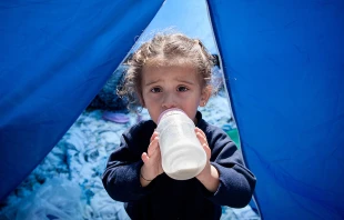 A Syrian refugee child at a camp in Serbia, October 2015.   vlada93/Shutterstock.