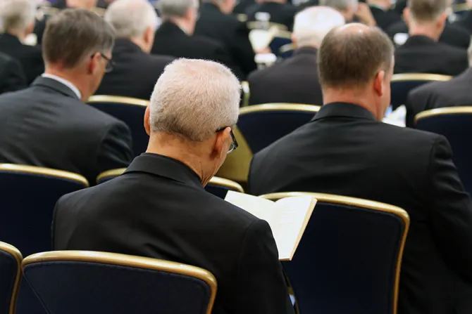 USCCB 6 11 Bishop during prayer at start of assembly