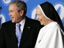 US President George Bush and Mother Assumpta Long, Prioress General of Dominican Sisters of Mary Mother of the Eucharist at the National Catholic Prayer Breakfast in Washington. (Photo: AP)