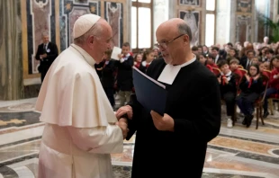 Pope Francis greets a representative of the De La Salle Brothers at the Vatican's Clementine Hall, May 16, 2019.   Vatican Media.