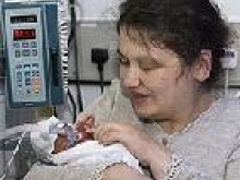 Varvara Artamkin with one of her new daughters