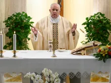 Pope Francis celebrates a morning Mass in the chapel of the Casa Santa Marta. 