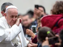 Pope Francis greets pilgrims before his general audience Feb. 26, 2020. 