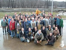 Seminarians, college students and volunteers sandbagged Cardinal Muench Seminary against the rising waters of the Red River. (