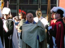 Bishop Samuel Aquila raises the monstrance in blessing toward the Red River Women’s Clinic / Photo by Tanya Watterud