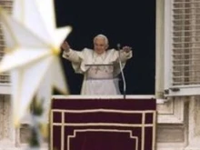 Pope Benedict XVI preaches about Christmas to the faithful in St. Peter's Square.