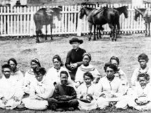 Fr. Damien poses for a picture with Hawaiian leprosy patients