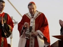 Cardinal Pell incensing the altar during WYD's opening Mass