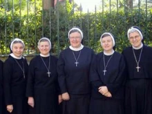 Mother Mary Clare Millea (center) with some of her fellow sisters