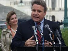 Marjorie Dannenfelser looks on while Rep. Christopher Smith (R-N.J.) speaks at a press conference in front of the U.S. Capitol building. 