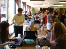 Volunteers help gather votes at the University of Nebraska's Newman Center in Lincoln.