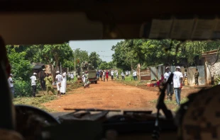 Soldiers patrolling on streets of Bangui, Central African Republic. View from inside military vehicle.   sandis sveicers / Shutterstock