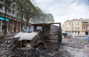 Burned car in the center of city after unrest in Odesa, Ukraine.   aragami12345s_Shutterstock