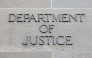 Sign for the Department of Justice (DOJ) in Washington, D.C.   Mark Van Scyoc / Shutterstock