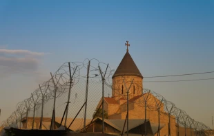 Armenian church behind barbed wire, Baghdad, Iraq. Via Shutterstock. 