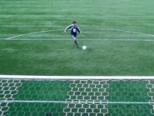 A player for the North American Martyrs knocks in a goal during the shoot-out