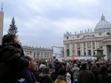 Father and son in St. Peter's Square during the Dec. 12 Angelus